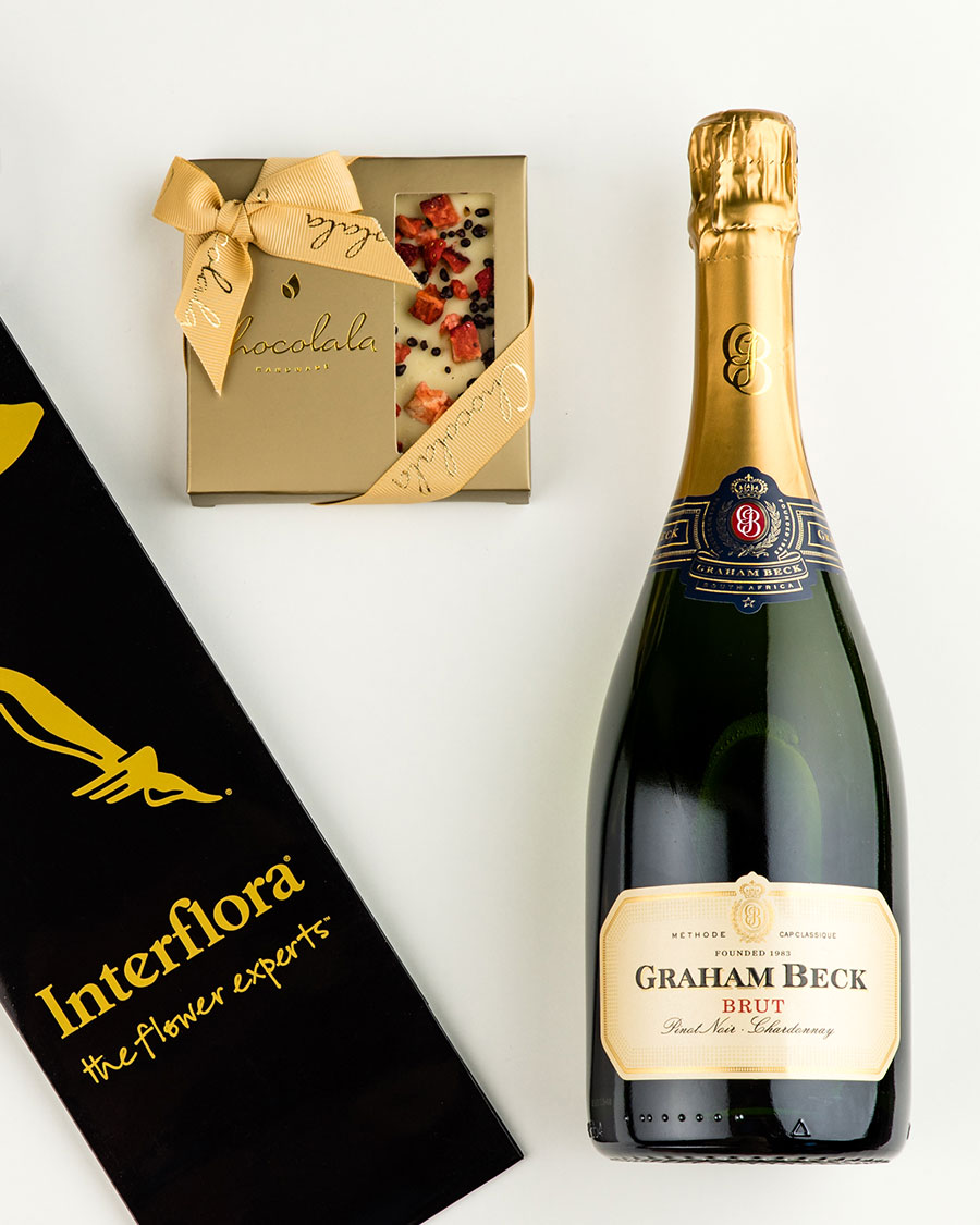 Gift bag with Graham Beck sparkling wine and strawberry-champagne chocolate