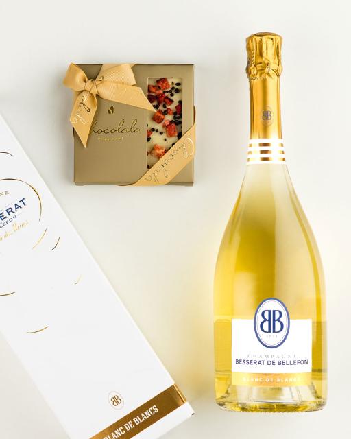 Gift bag with Besserat de Bellefon Blanc champagne and strawberry-champagne chocolate